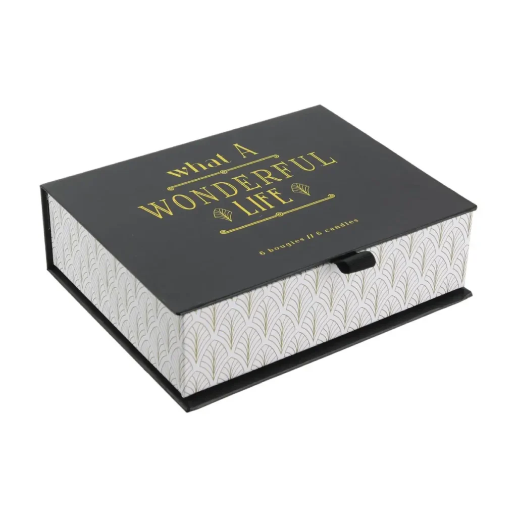 Geopende WDMT cadeaubox met 6 geurkaarsen in glazen houders